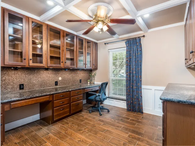 a kitchen with stainless steel appliances granite countertop a stove and a sink with granite countertops