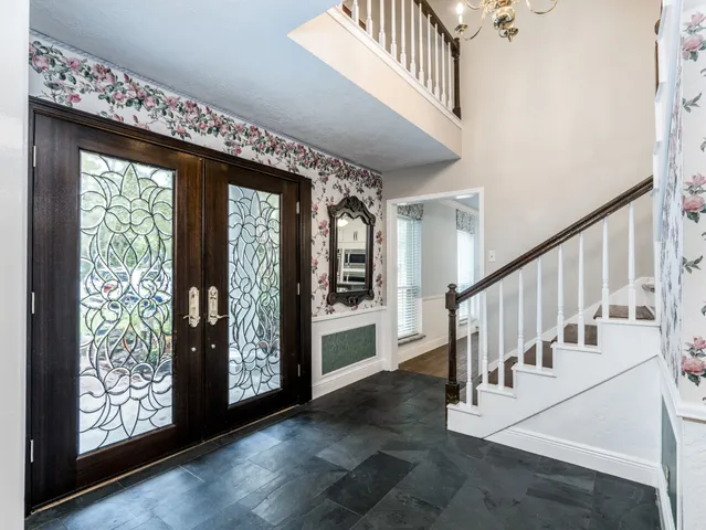 a view of an entryway with staircase