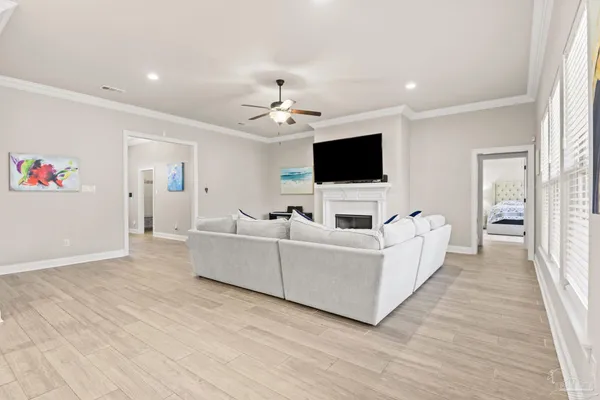 a living room with furniture and white walls
