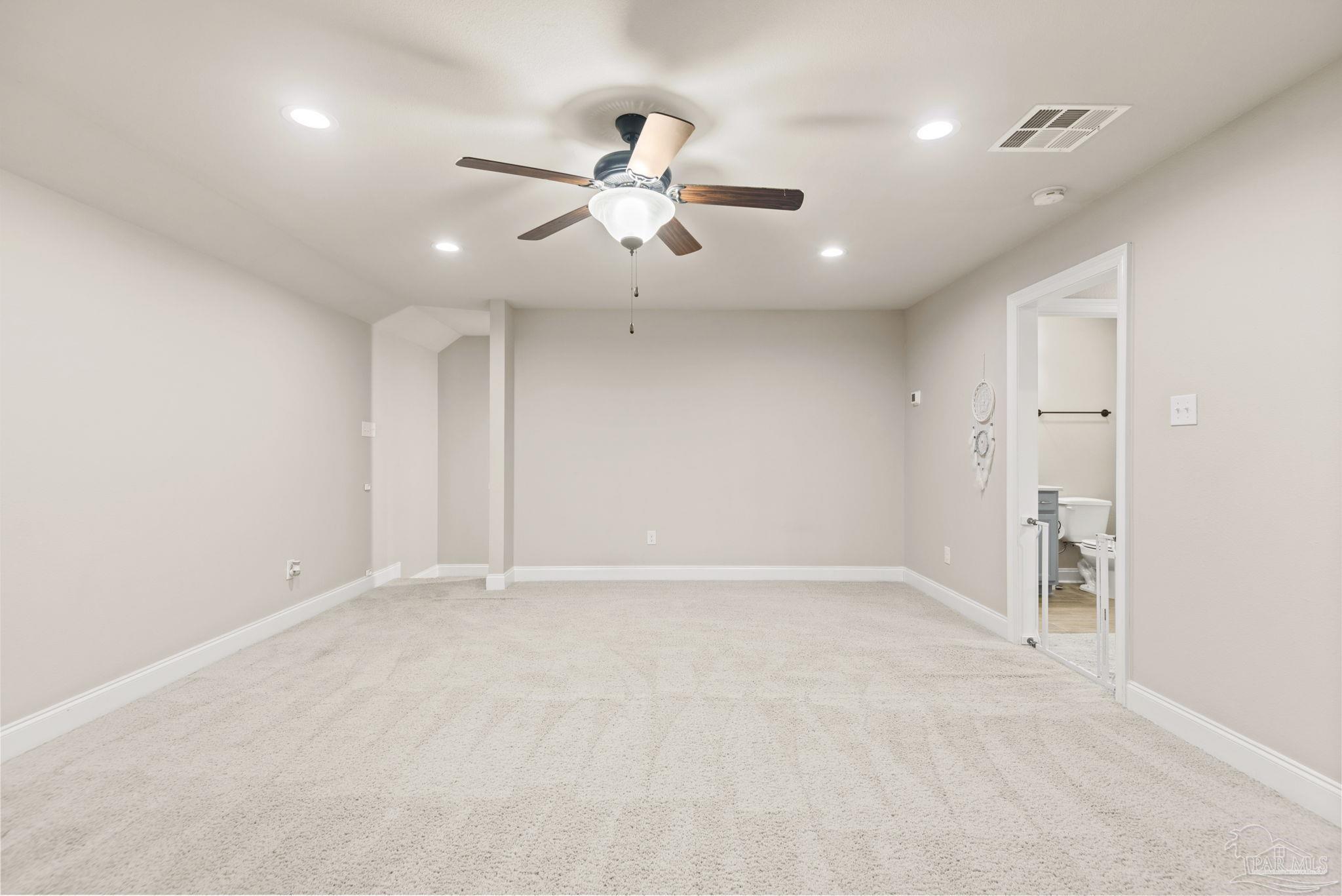 5912 Walter Franklin Road Pensacola, FL 32526 - Photo 41 of 51 an empty room with windows and fan