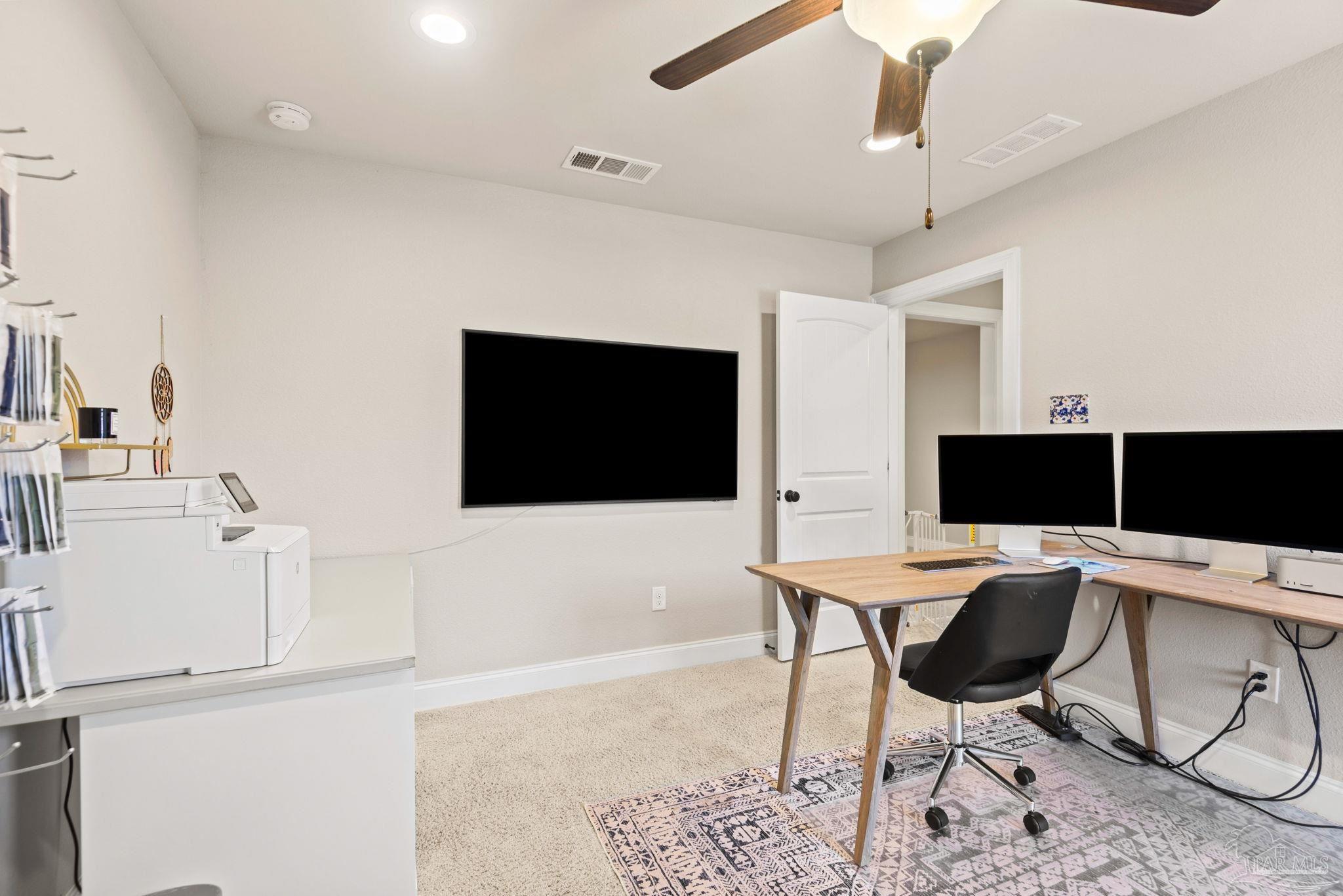 5912 Walter Franklin Road Pensacola, FL 32526 - Photo 45 of 51 a work room with wooden floor and chandelier