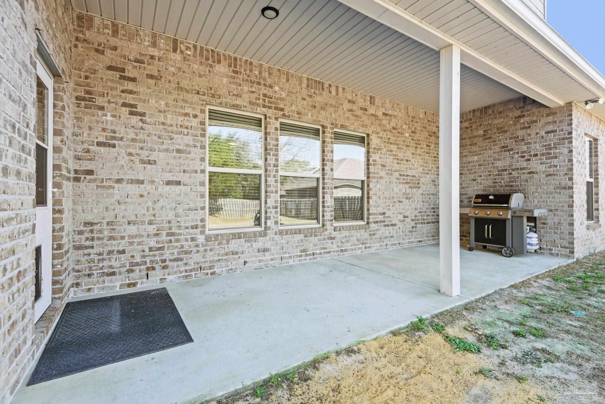 5912 Walter Franklin Road Pensacola, FL 32526 - Photo 47 of 51 a view of front door of house with seating space
