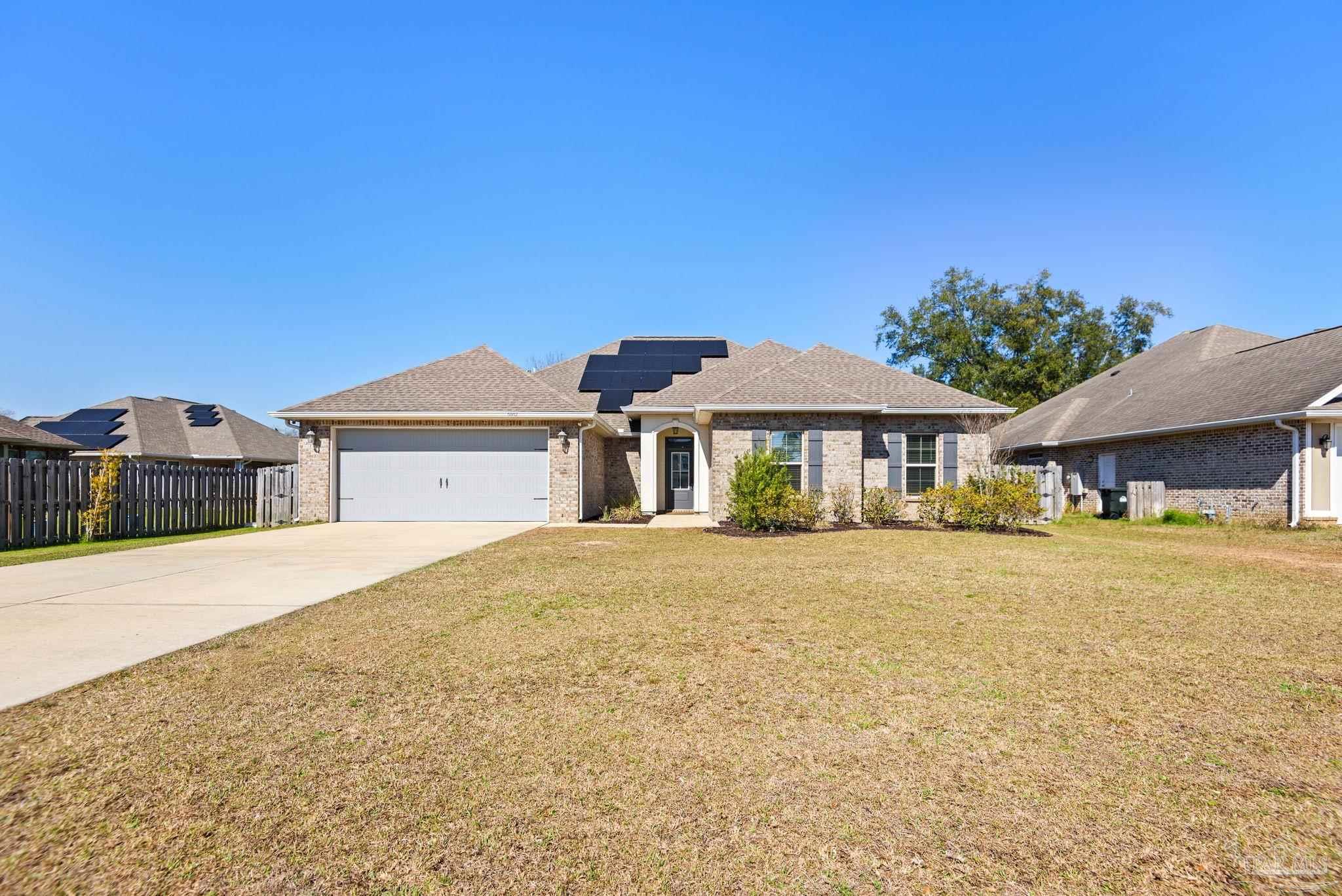 5912 Walter Franklin Road Pensacola, FL 32526 - Photo 5 of 51 a front view of a house with yard