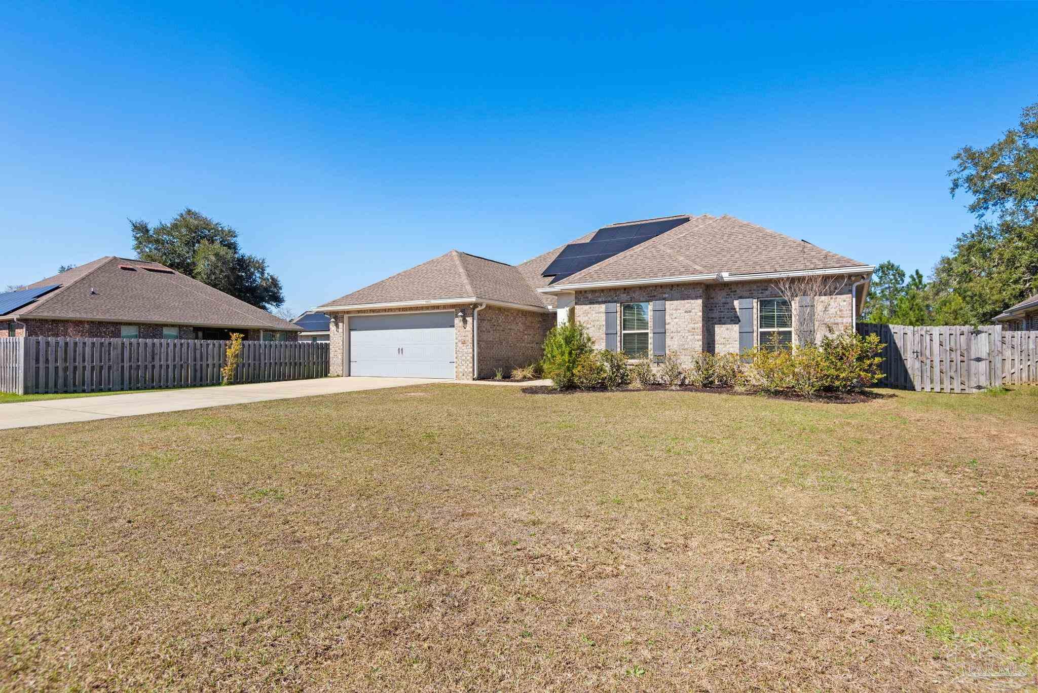 5912 Walter Franklin Road Pensacola, FL 32526 - Photo 6 of 51 a front view of a house with yard