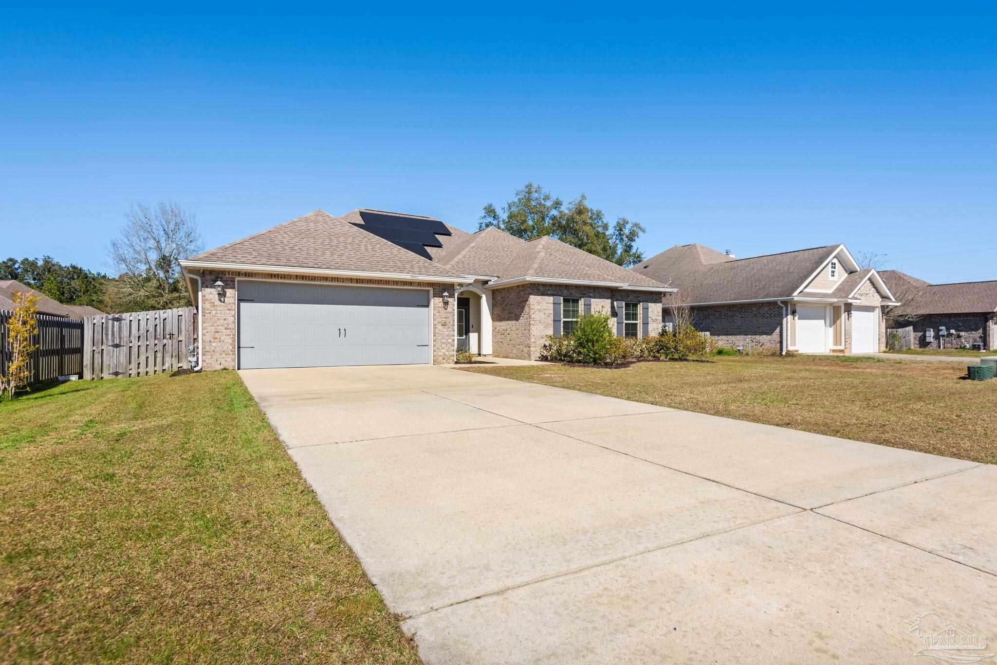 5912 Walter Franklin Road Pensacola, FL 32526 - Photo 7 of 51 a front view of a house with a garden