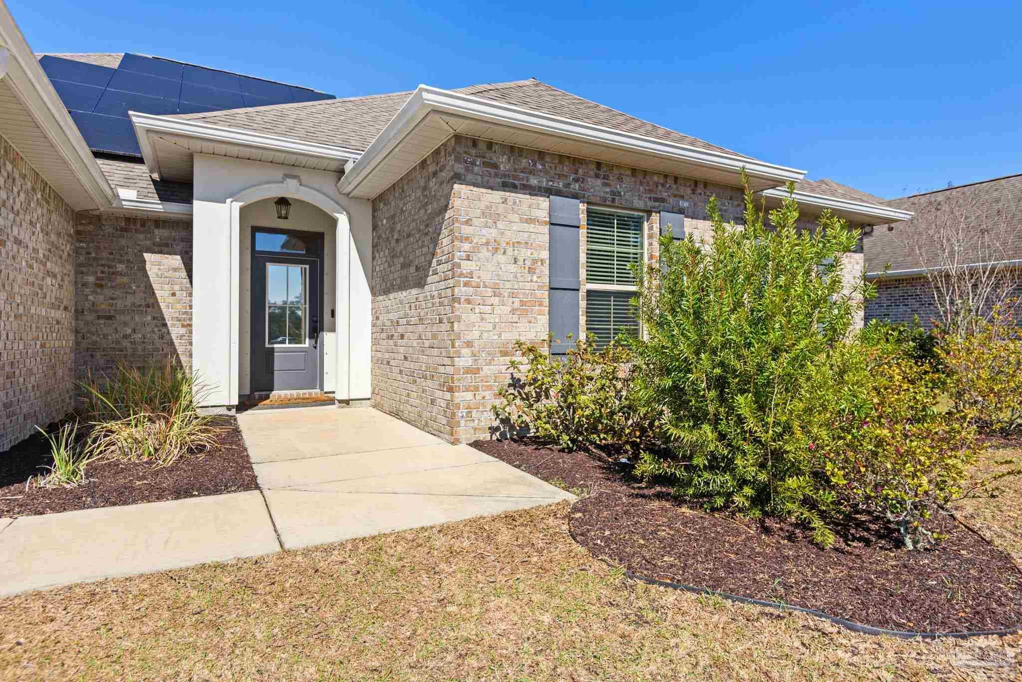 5912 Walter Franklin Road Pensacola, FL 32526 - Photo 8 of 51 a front view of a house with garden
