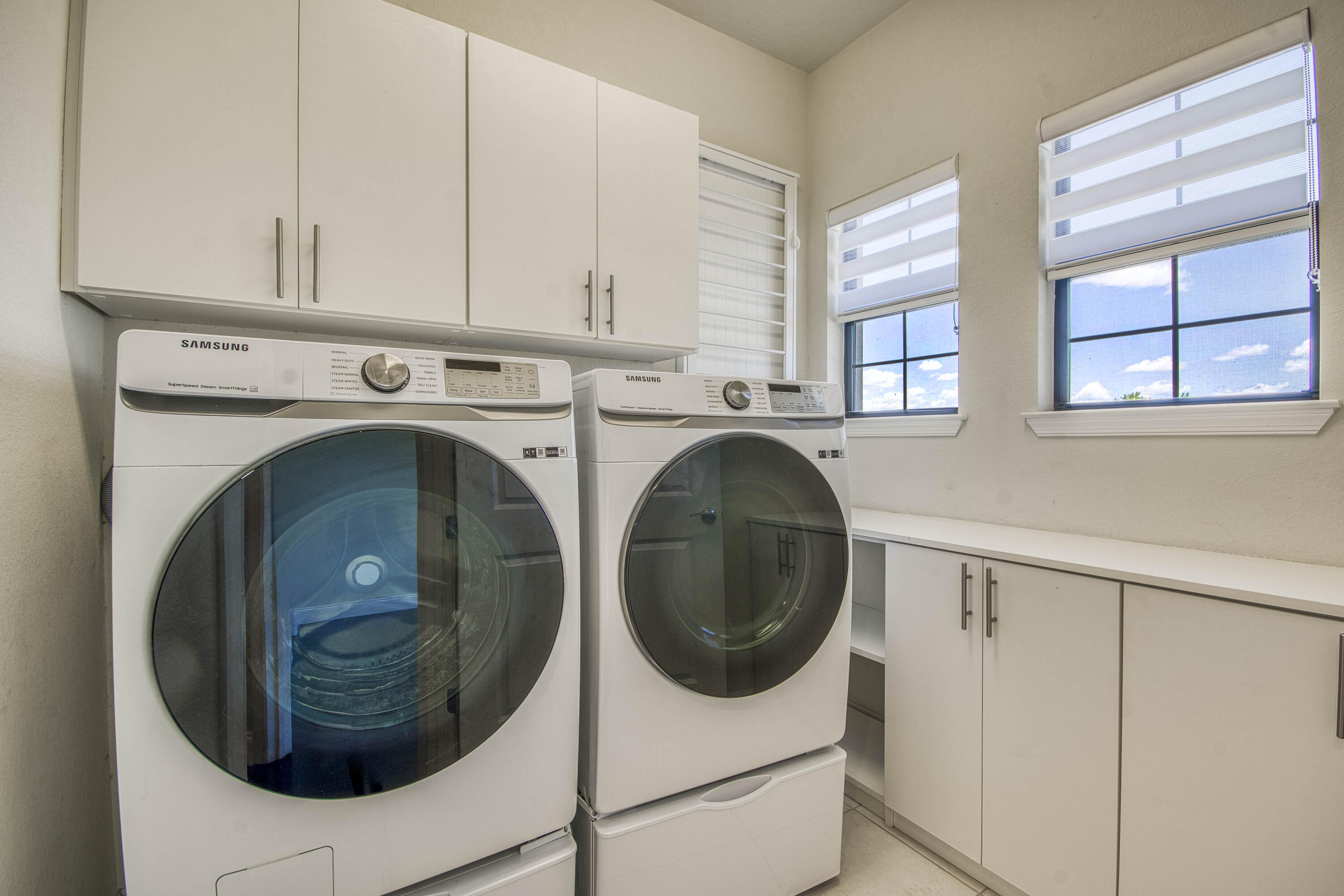8301 Rearing Lane Lake Worth, FL 33467 - Photo 26 of 33 a utility room with dryer and washer