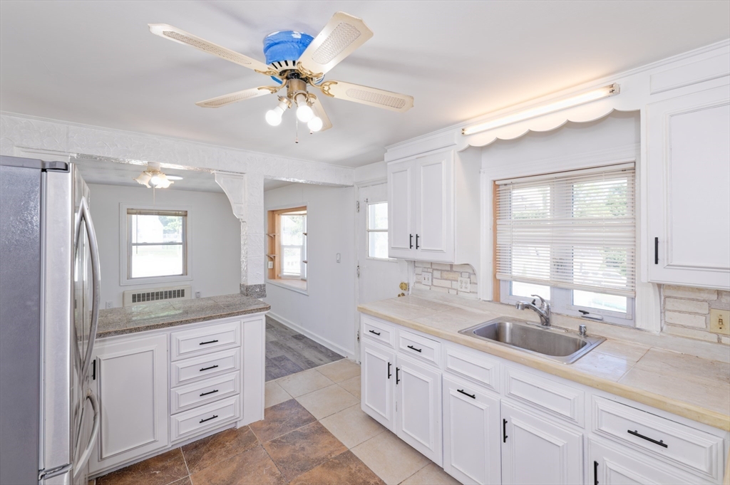 1 Rockland Rd Court Auburn, MA 01501 - Photo 15 of 38 a kitchen with cabinets appliances and a window