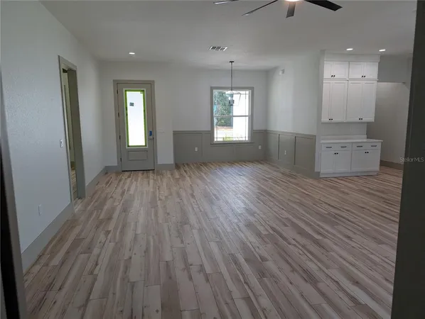 a view of an empty walk in closet