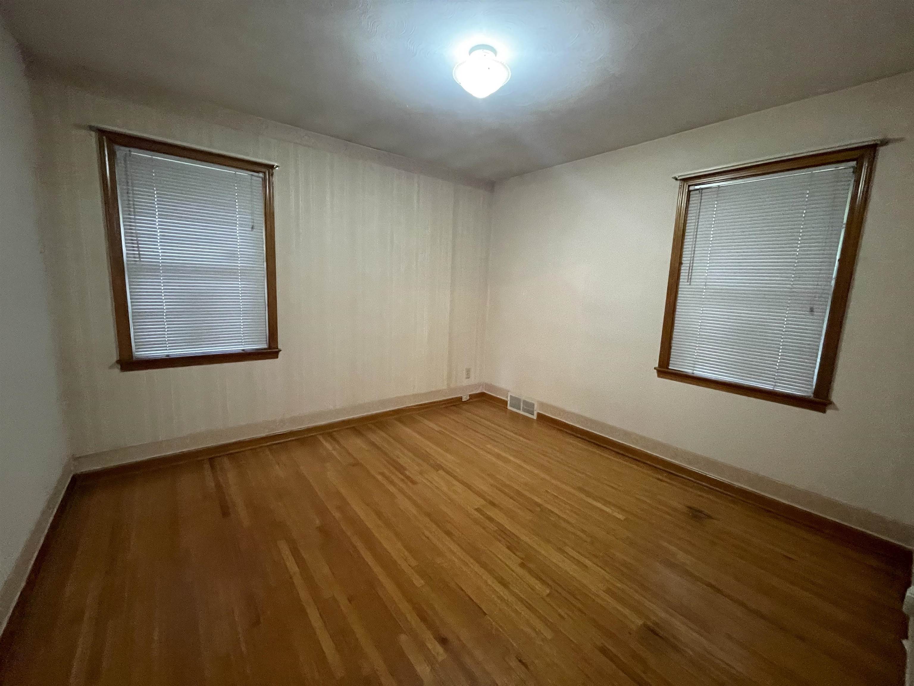4857 Millbranch Road Memphis, TN 38116 - Photo 20 of 31 Empty room with light hardwood / wood-style floors