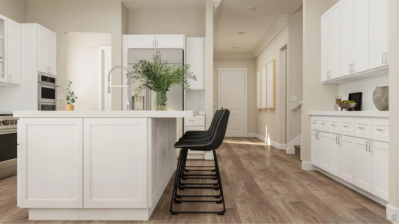17965 St Andrews Drive Poway, CA 92064 - Photo 4 of 22 a view of a dining room with furniture and wooden floor