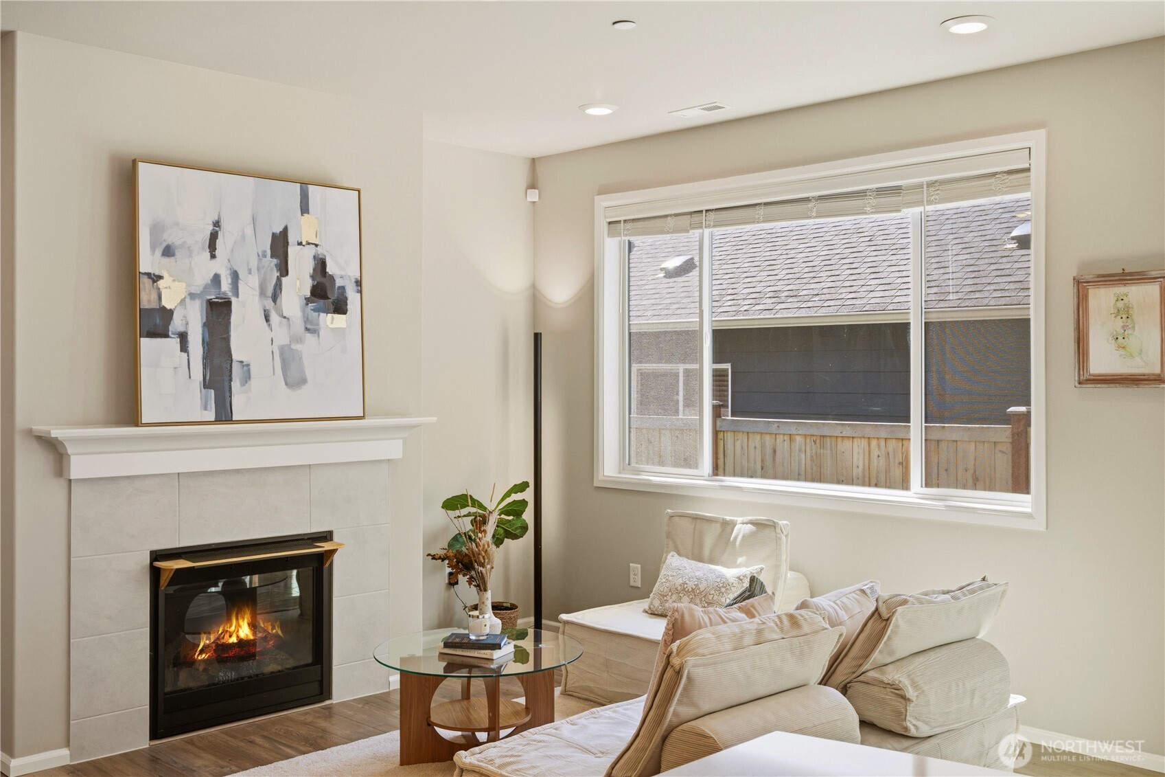 19432 9th Avenue Southeast Bothell, WA 98012 - Photo 3 of 33 a living room with furniture a window and a fireplace