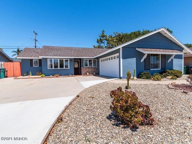 4061 Constellation Road Lompoc, CA 93436 - Photo 2 of 20 a front view of a house with a yard