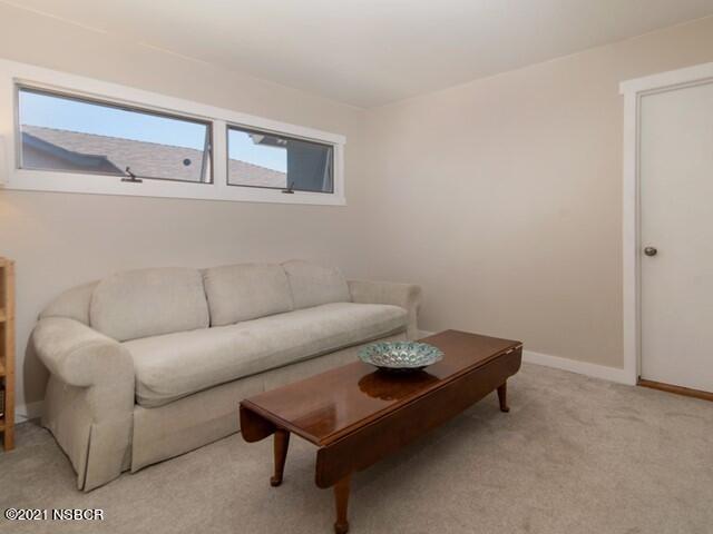 4061 Constellation Road Lompoc, CA 93436 - Photo 16 of 20 a living room with furniture and a table