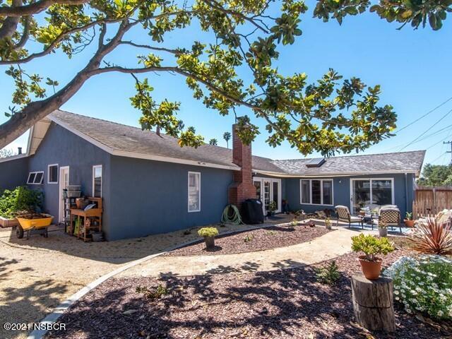 4061 Constellation Road Lompoc, CA 93436 - Photo 17 of 20 a front view of a house with a yard