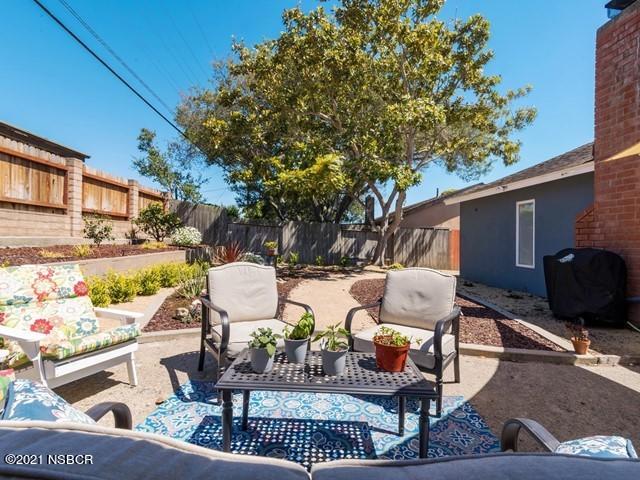 4061 Constellation Road Lompoc, CA 93436 - Photo 19 of 20 a view of outdoor sitting area with furniture and wooden floor