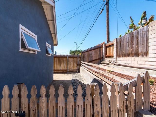 4061 Constellation Road Lompoc, CA 93436 - Photo 20 of 20 a view of a backyard with wooden fence
