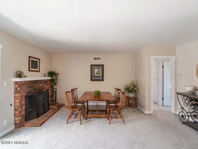 4061 Constellation Road Lompoc, CA 93436 - Photo 5 of 20 a living room with furniture and a fireplace