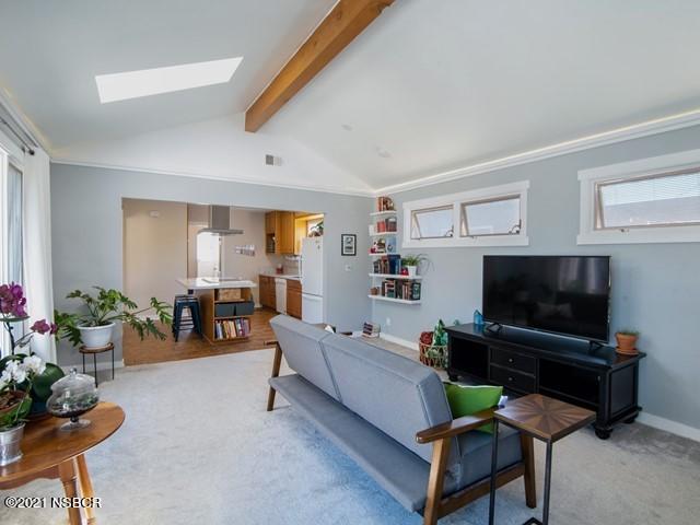 4061 Constellation Road Lompoc, CA 93436 - Photo 9 of 20 a living room with furniture and a flat screen tv