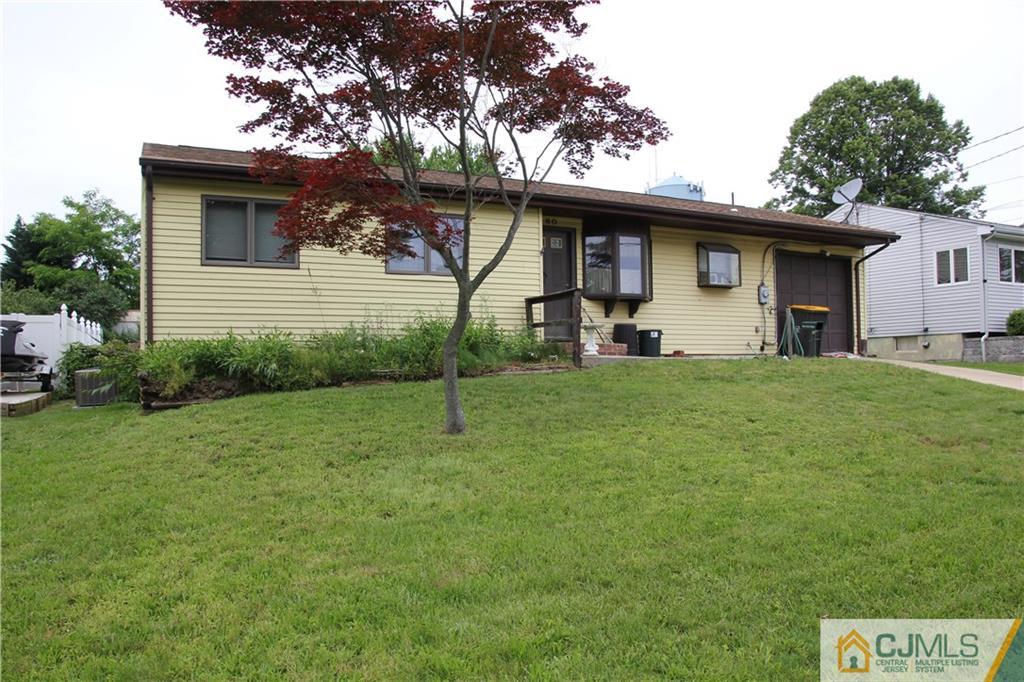 60 Princeton Road Old Bridge, NJ 08859 - Photo 1 of 6 a view of a house with a backyard