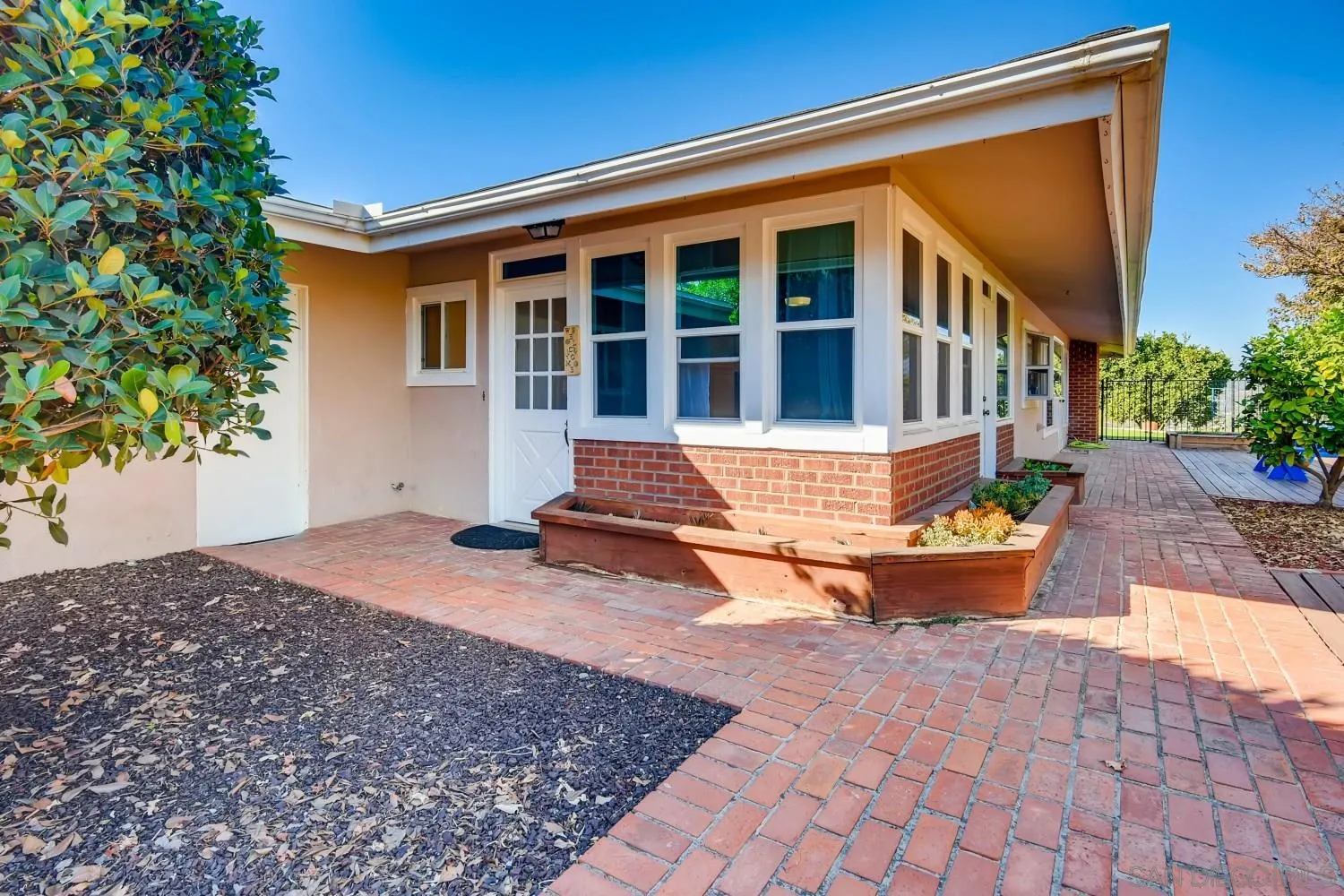 9312 Jovic Road Lakeside, CA 92040 - Photo 2 of 26 a front view of a house with a yard