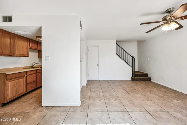 a view of a kitchen with electric appliances