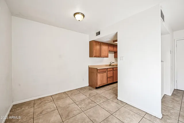 a living room with a couch and a flat screen tv