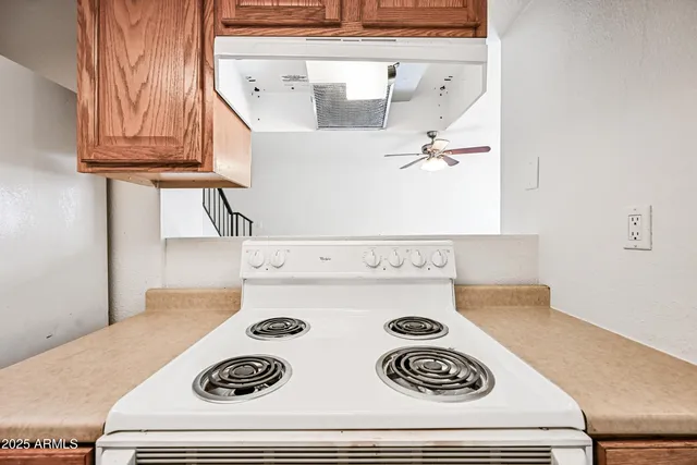 a view of kitchen island with sink
