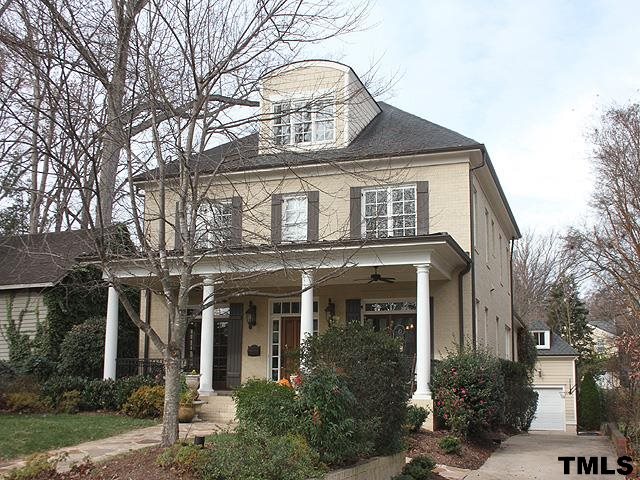 2105 Cowper Drive Raleigh, NC 27608 - Photo 2 of 25 front view of a house with a trees