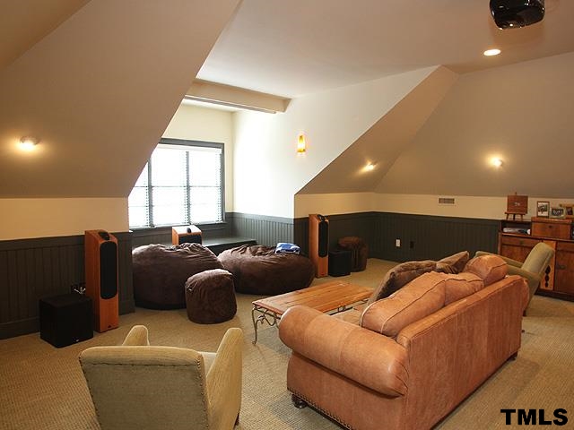2105 Cowper Drive Raleigh, NC 27608 - Photo 15 of 25 a living room with furniture and a large window