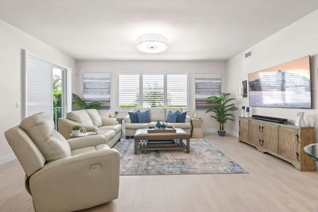 a view of a hallway with windows