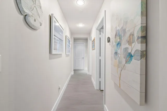 a view of a bathroom with a glass door shower