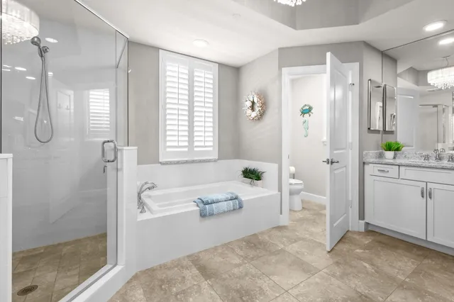 a bedroom with a bed and a chair