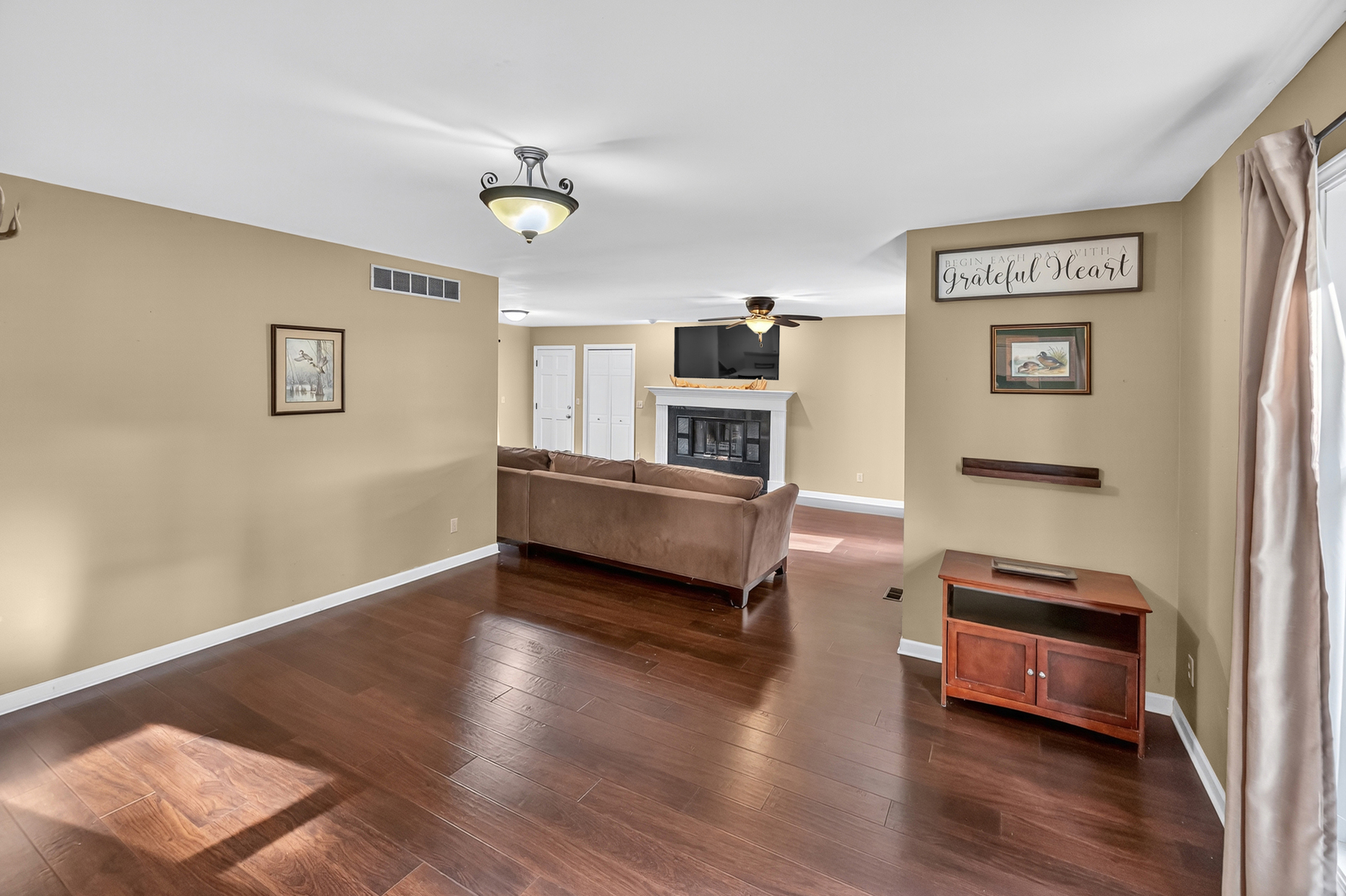 4454 North Prairie View Road Argenta, IL 62501 - Photo 11 of 45 a living room with furniture and a wooden floor