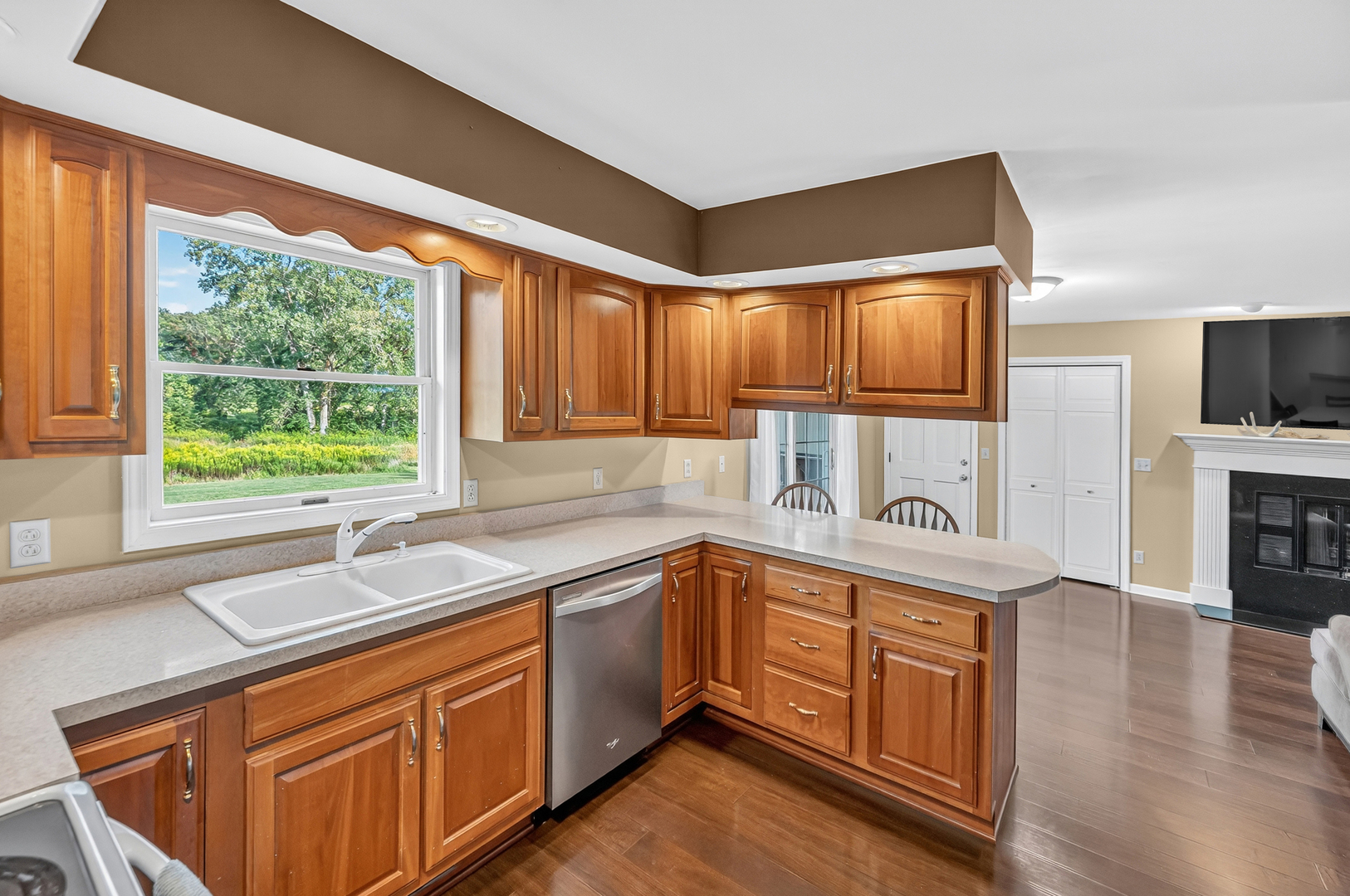 4454 North Prairie View Road Argenta, IL 62501 - Photo 13 of 45 a kitchen with a sink stove top oven and cabinets