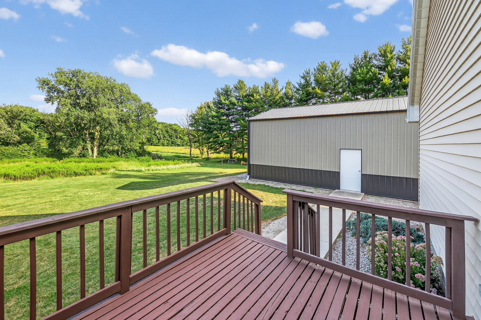 4454 North Prairie View Road Argenta, IL 62501 - Photo 17 of 45 a view of a balcony with wooden floor