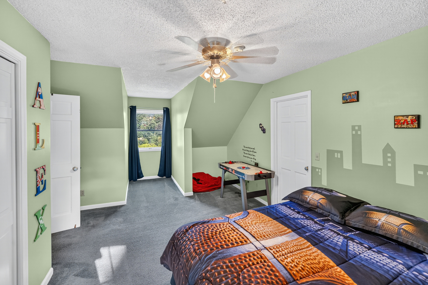 4454 North Prairie View Road Argenta, IL 62501 - Photo 26 of 45 a bedroom with a bed and a chandelier