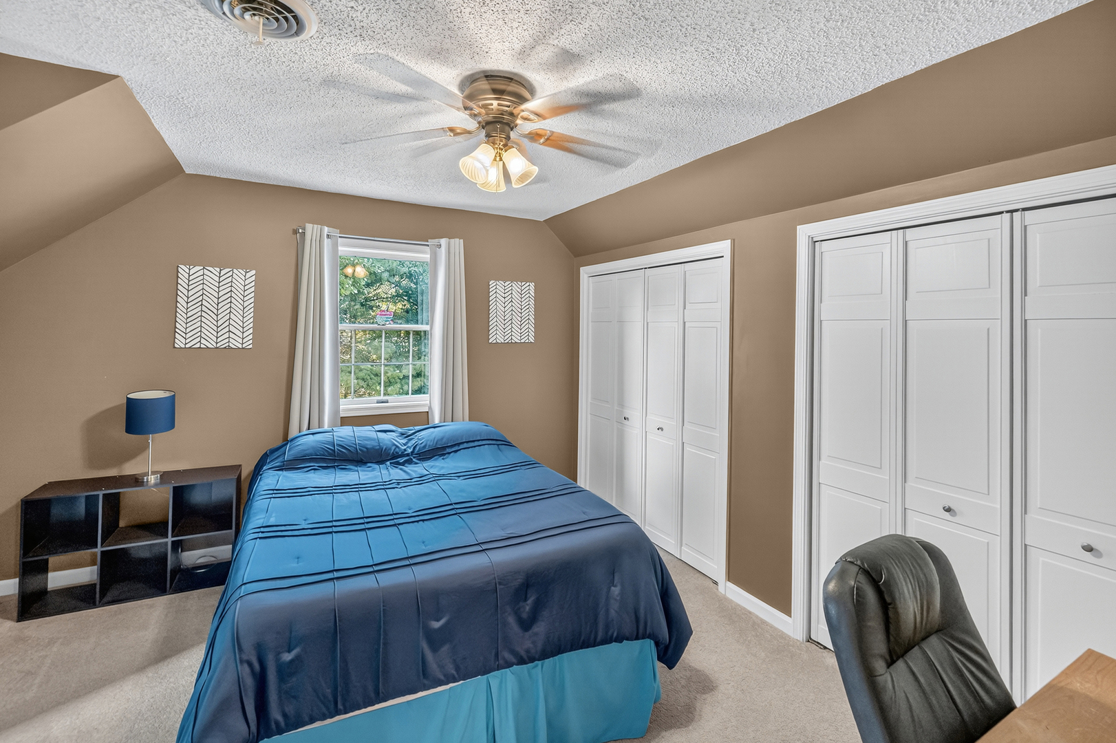 4454 North Prairie View Road Argenta, IL 62501 - Photo 27 of 45 a bedroom with a bed and a chandelier