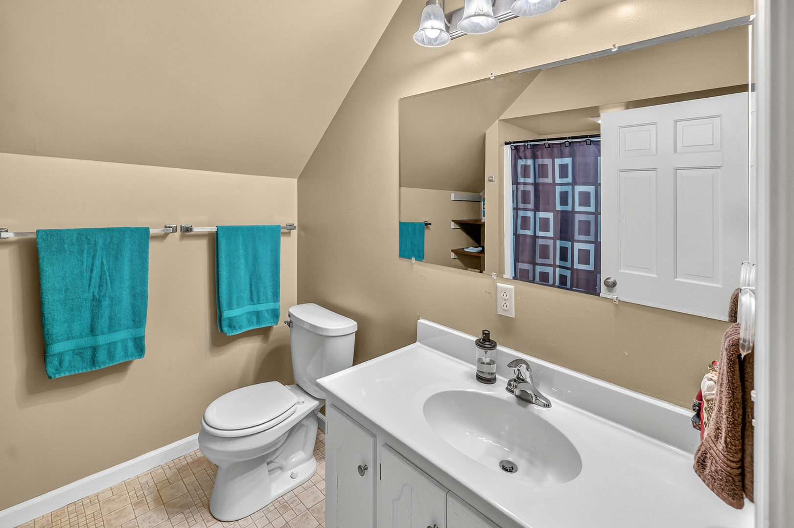 4454 North Prairie View Road Argenta, IL 62501 - Photo 29 of 45 a bathroom with a toilet a sink and a window