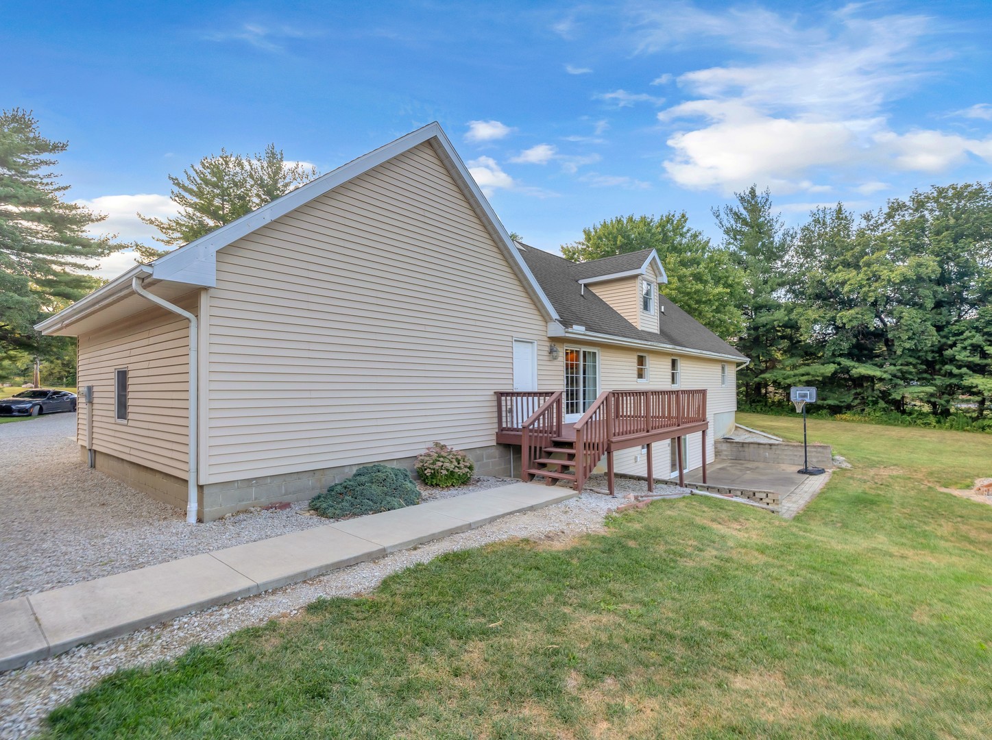 4454 North Prairie View Road Argenta, IL 62501 - Photo 40 of 45 a view of a house with a yard and sitting area