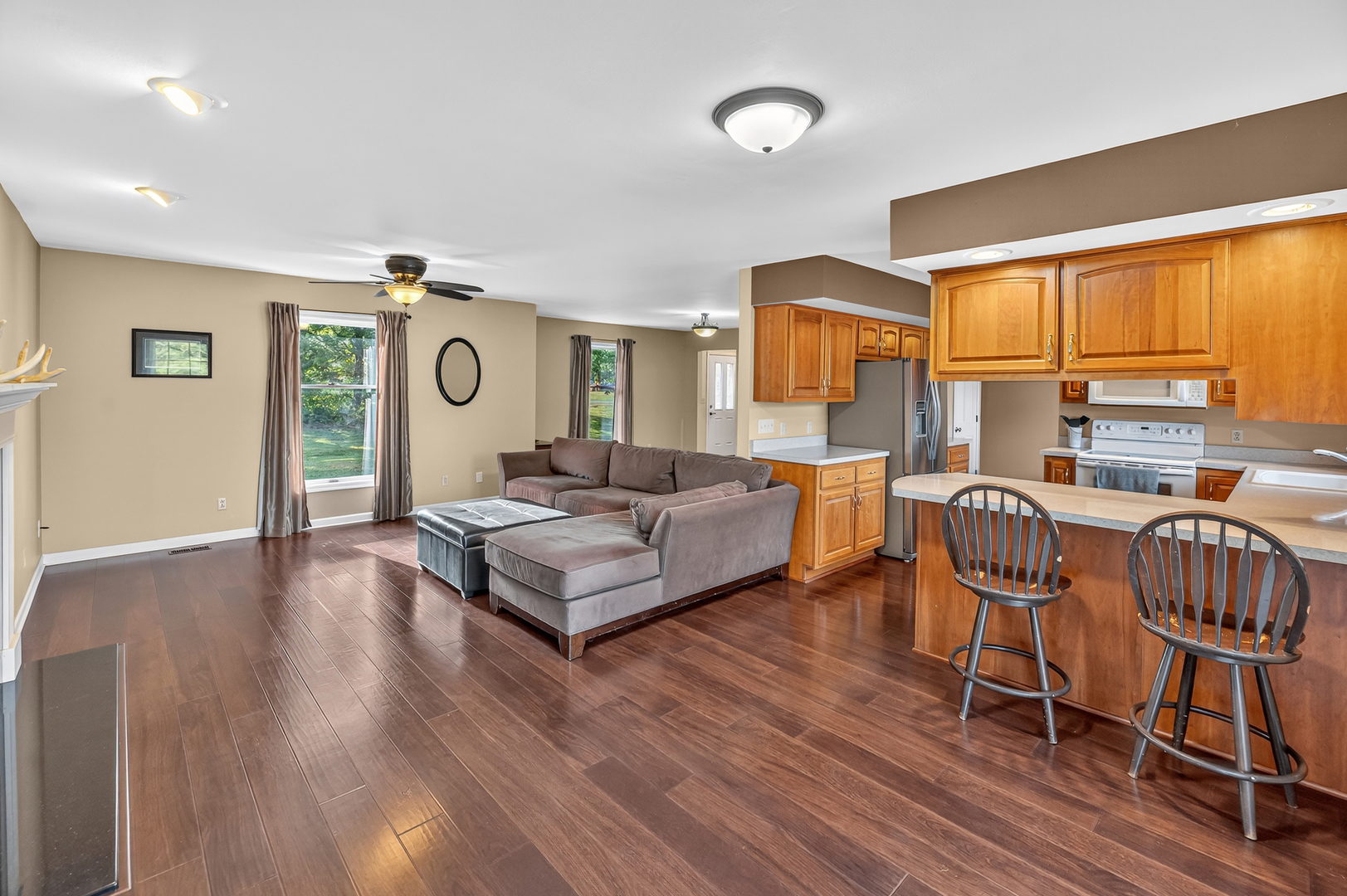 4454 North Prairie View Road Argenta, IL 62501 - Photo 7 of 45 a living room with furniture and a large window