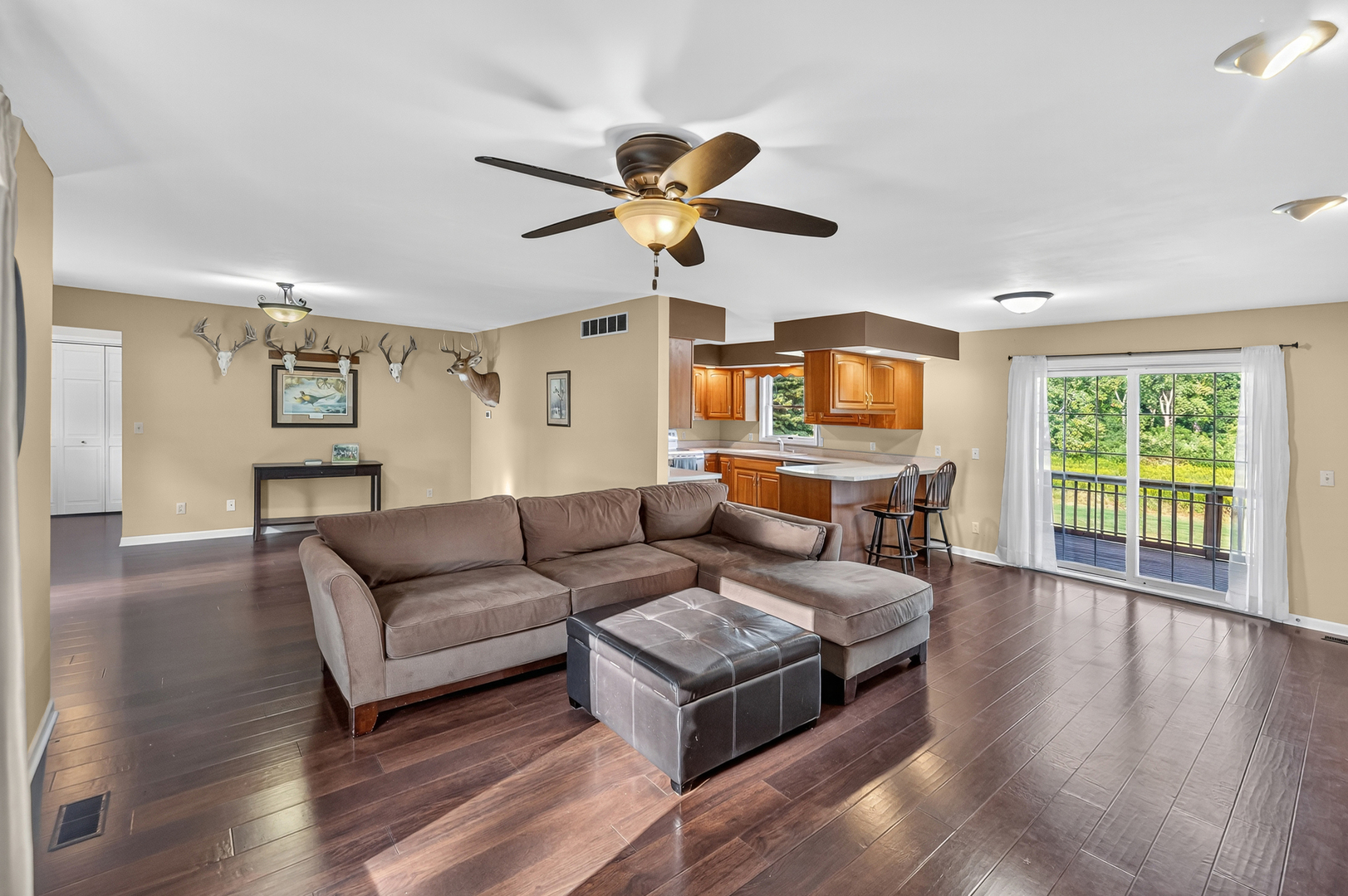 4454 North Prairie View Road Argenta, IL 62501 - Photo 8 of 45 a living room with furniture and a large window