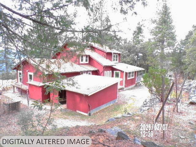 1881 Laytonville Dos Rios Road Laytonville, CA 95454 - Photo 2 of 29 a view of a red and white house with a yard in front of it