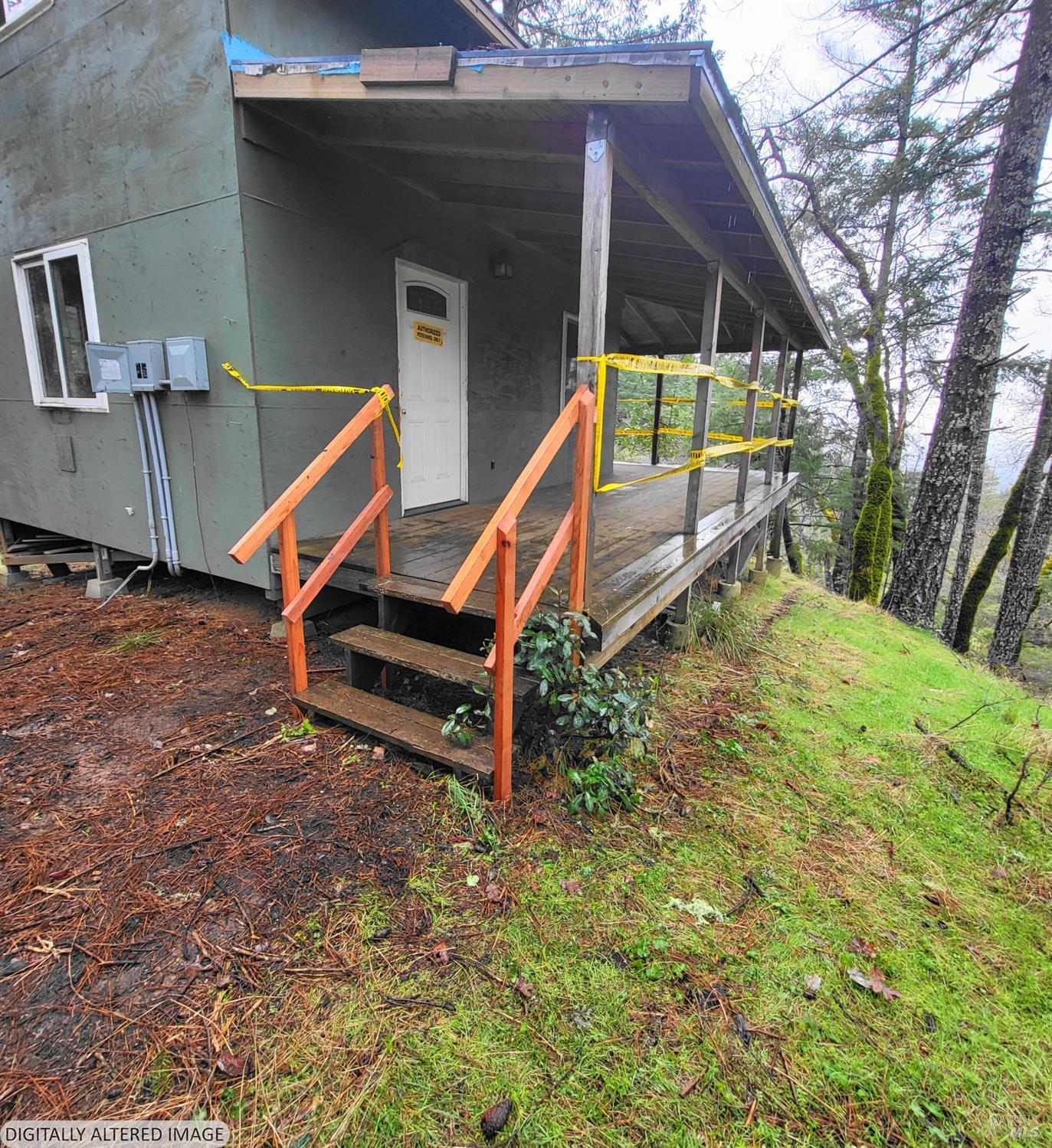 1881 Laytonville Dos Rios Road Laytonville, CA 95454 - Photo 21 of 29 a backyard of a house with table and chairs