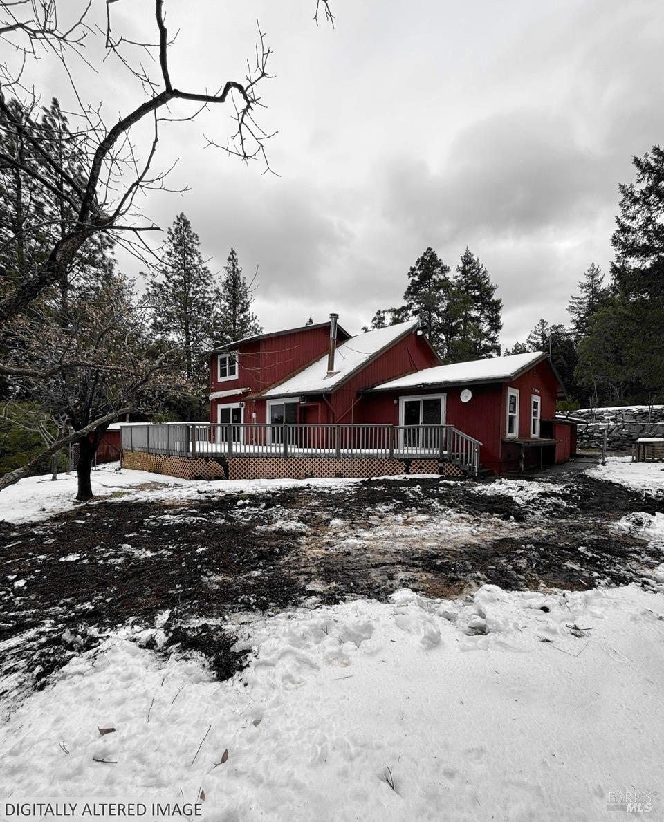 1881 Laytonville Dos Rios Road Laytonville, CA 95454 - Photo 4 of 29 a view of a house with a yard covered in snow