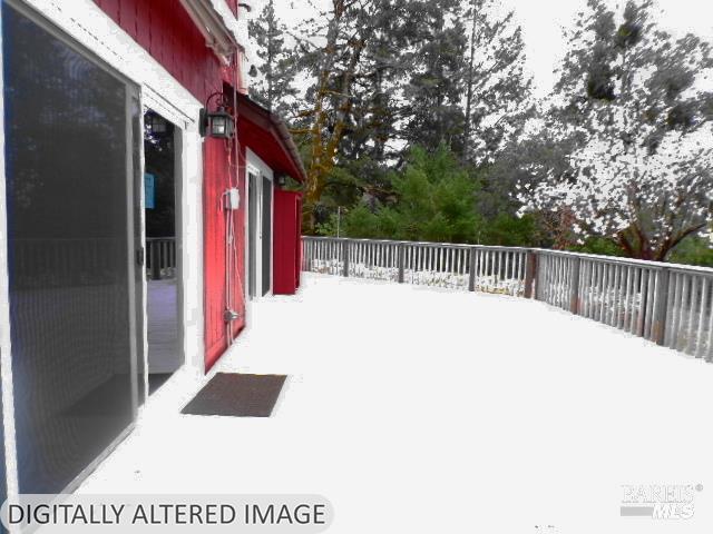 1881 Laytonville Dos Rios Road Laytonville, CA 95454 - Photo 5 of 29 a view of balcony with wooden floor and fence