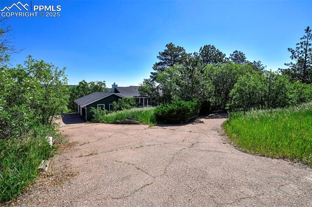 4380 Sandstone Road Monument, CO 80132 - Photo 3 of 48 View of front of property featuring driveway