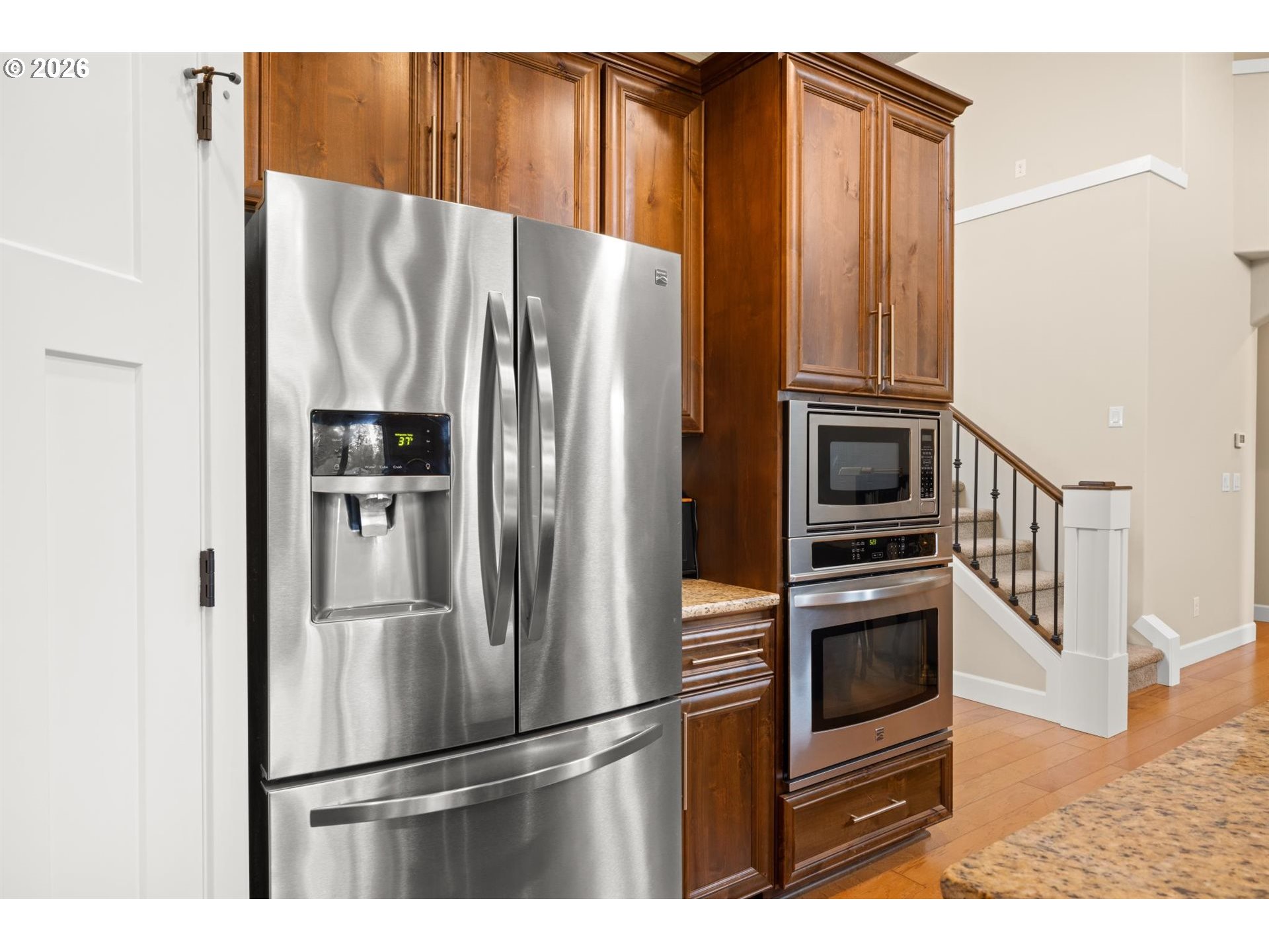 1274 South 15th Way Ridgefield, WA 98642 - Photo 12 of 46 a kitchen with stainless steel appliances and refrigerator