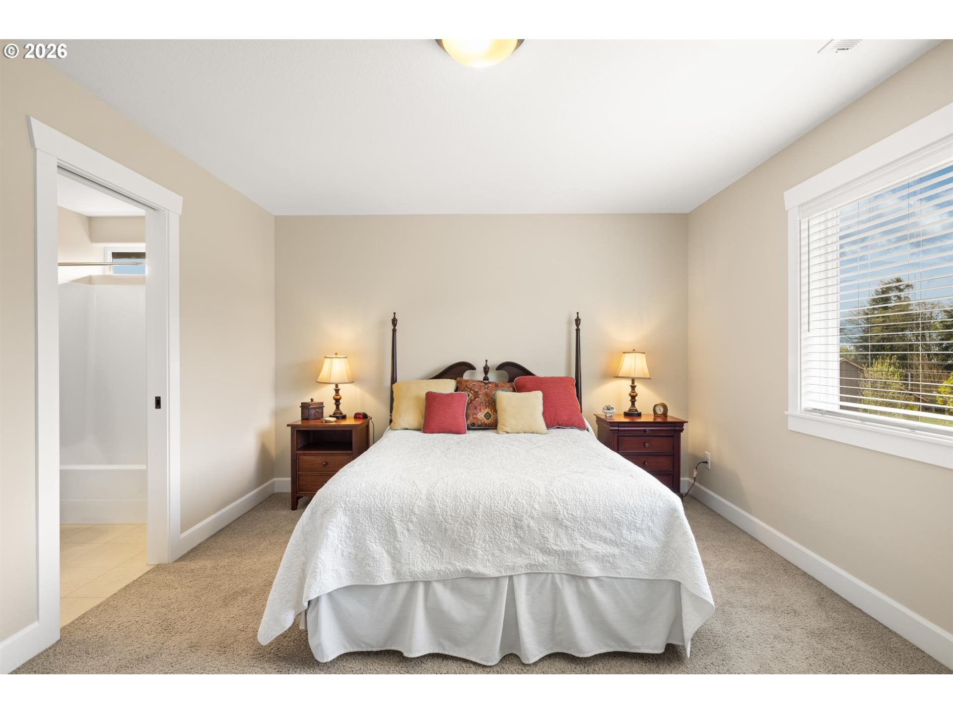 1274 South 15th Way Ridgefield, WA 98642 - Photo 22 of 46 a bedroom with a bed and a night stand