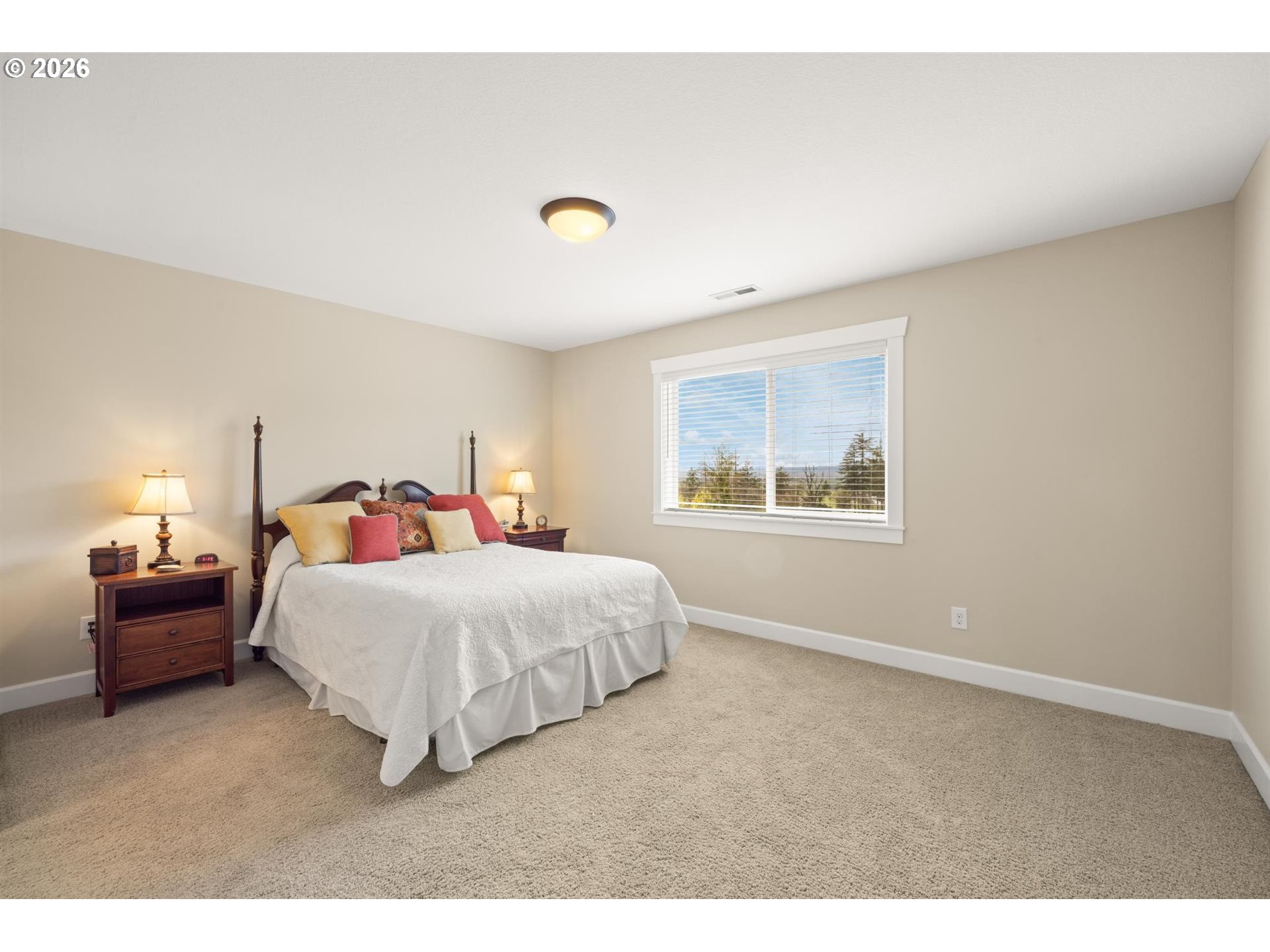 1274 South 15th Way Ridgefield, WA 98642 - Photo 23 of 46 a bedroom with a bed and a couch